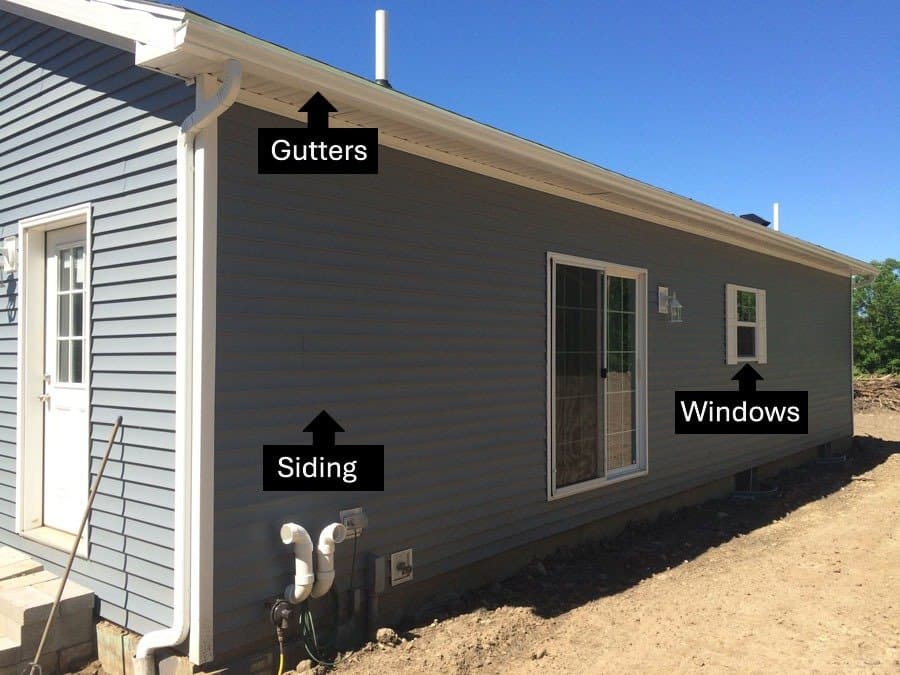 House diagram showing gutters, siding, and windows — all services JAB provides